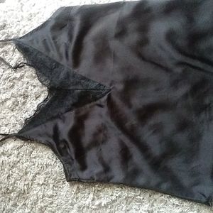 "RUE 21" SILKY BLACK CAMISOLE TOP WITH LACE DETAILING AT NECKLINE.